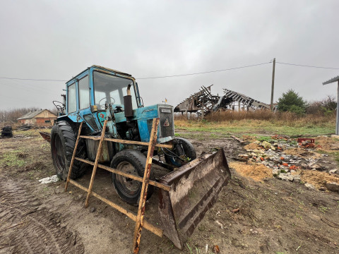 Damaged agricultural machinery of the family farm "Svitanok". The village Pochepin, Bucha district, Kyiv region. 16 November 2022.