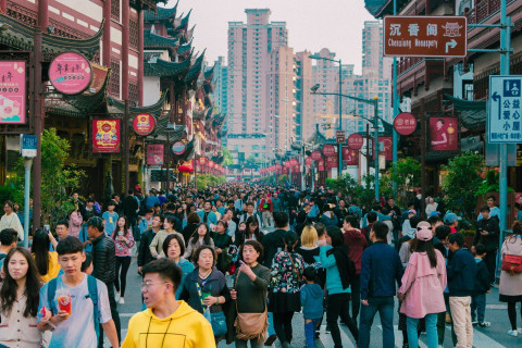 © Javier Quiroga/Unsplash. Busy street in Shanghai, April 2019. 